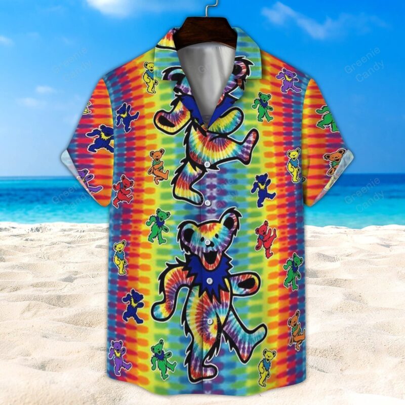 Colorful tie-dye shirt with playful bear pattern, short sleeves, perfect for casual beachwear or summer outings.