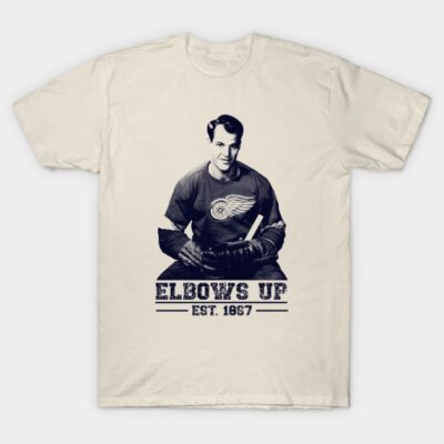 Vintage-style beige t-shirt with hockey player graphic, "Elbows Up" text, and retro design, ideal for casual wear.