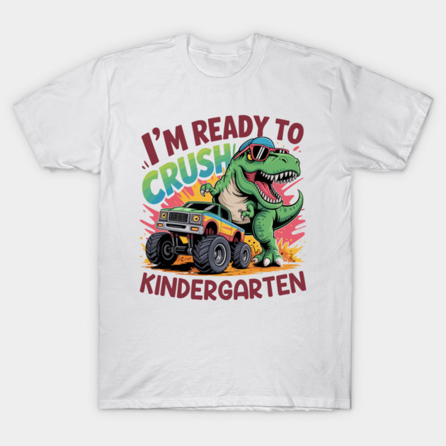 White kids' T-shirt with colorful dinosaur and monster truck print, "I'm Ready to Crush Kindergarten" message. Cotton fabric.