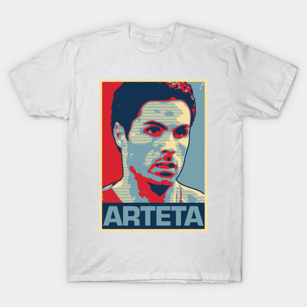 White graphic t-shirt with colorful pop art design, featuring bold "ARTETA" text below. Casual wear, cotton material.