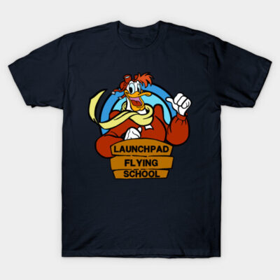 Navy blue graphic t-shirt with cartoon design and "Launchpad Flying School" text, casual wear, cotton material.