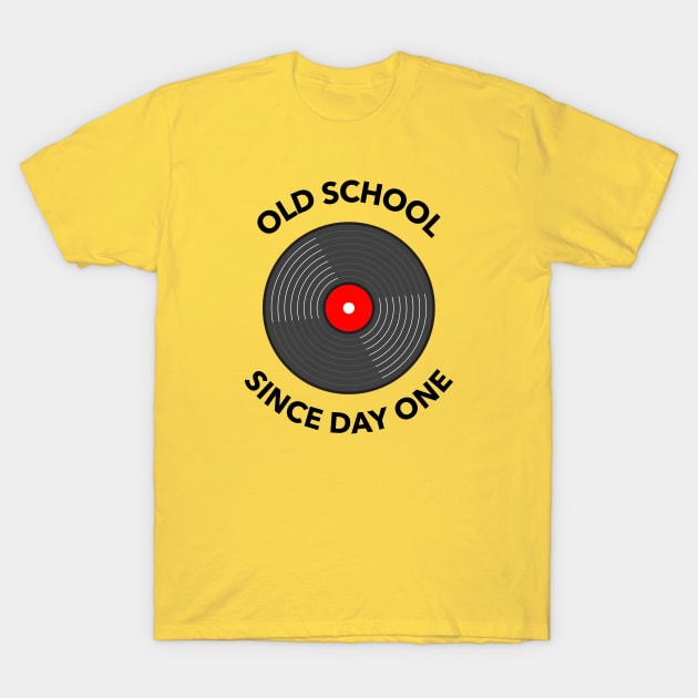Yellow t-shirt with "Old School Since Day One" vinyl record design, casual style, cotton material for everyday wear.