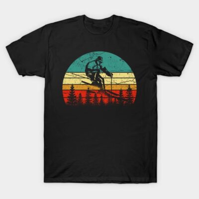 Black t-shirt with retro skiing design, featuring colorful stripes and pine trees, perfect for outdoor enthusiasts.