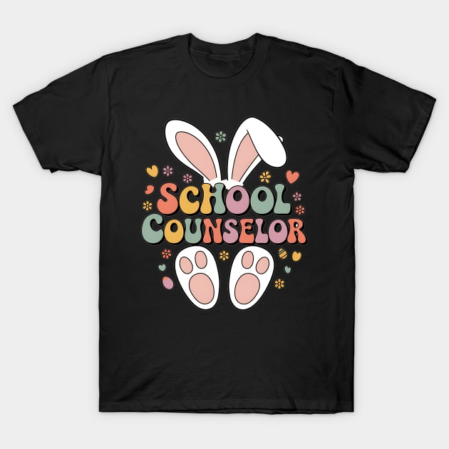 Black t-shirt with colorful "School Counselor" text, bunny ears, and paw design. Ideal for casual wear or gifts.