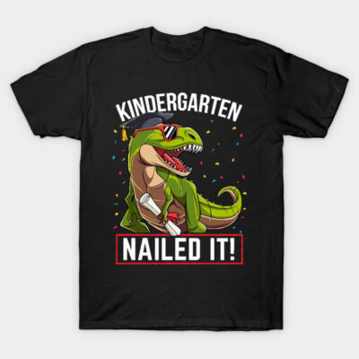 Black T-shirt with playful dinosaur graphic, "Kindergarten Nailed It!" text, ideal for celebrating graduation.