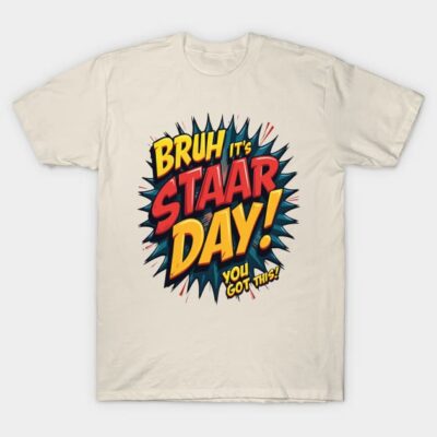 Cream T-shirt with bold comic-style text "Bruh It's STAAR Day!" promoting motivation and positivity.