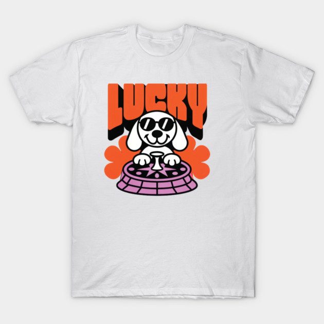White cotton T-shirt with playful dog graphic and "Lucky" text in bold orange. Casual wear for everyday style.