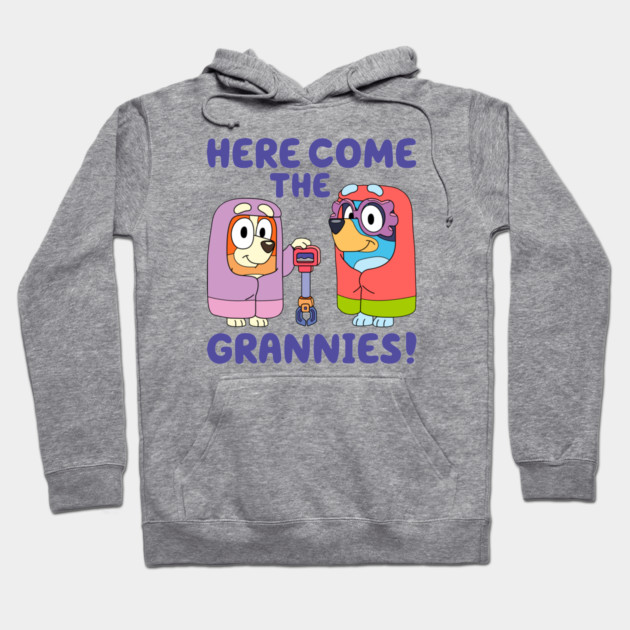 Gray hoodie with colorful cartoon characters and text "Here Come the Grannies." Cozy casual wear, unisex style.