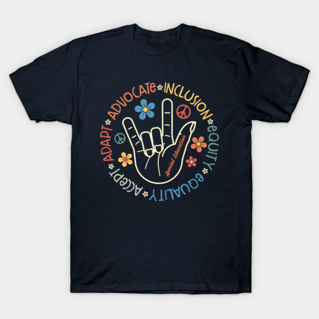 Navy blue t-shirt with colorful graphic promoting inclusion, equality, and advocacy, featuring hand sign and flowers.