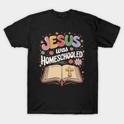 Black T-shirt with colorful "Jesus Was Homeschooled" text and book graphic, casual wear, cotton material.
