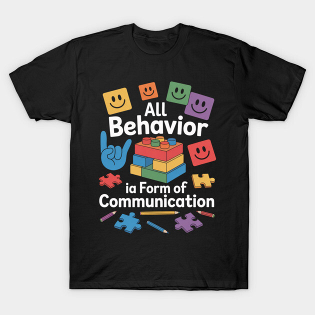 Black t-shirt with colorful puzzle and block graphics, featuring the text "All Behavior is a Form of Communication."