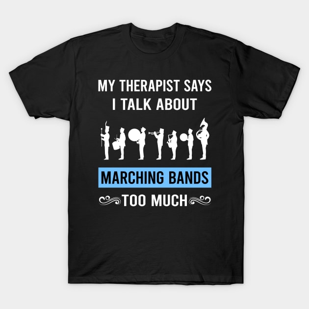 Black t-shirt with white text "My therapist says I talk about marching bands too much" and marching band silhouettes.