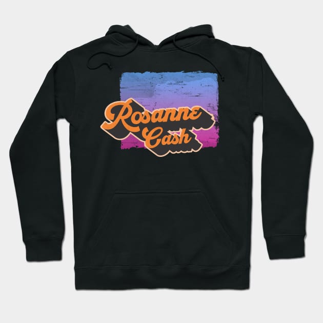 Black hoodie with colorful retro graphic design, kangaroo pocket, drawstring hood, casual wear, cozy cotton blend.
