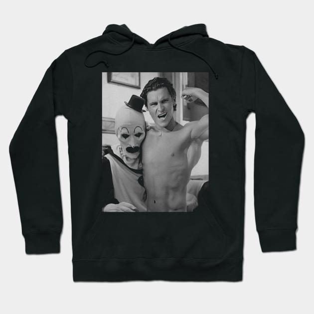 Black hoodie with a vintage-style print featuring a clown and flexing figure. Casual wear, cotton blend, unisex design.