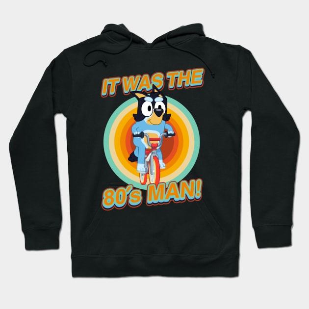 Black hoodie with retro cartoon design and text "It Was the 80's Man!", perfect for casual wear or themed events.
