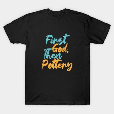 Black T-shirt with colorful "First God, Then Pottery" text design, casual style, cotton material.