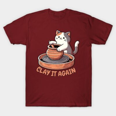 Red T-shirt with cute cat pottery design and "Clay It Again" text, perfect for casual wear or gift.
