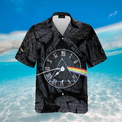 Black graphic short-sleeve shirt with clock and rainbow design, beach background. Ideal for casual wear. Polyester material.