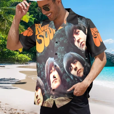 Retro black Hawaiian shirt with vintage album cover and orange lettering, perfect for beachwear or casual outings.