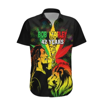 Colorful reggae-themed short-sleeve shirt with lion design, black base, vibrant graphics, casual wear.