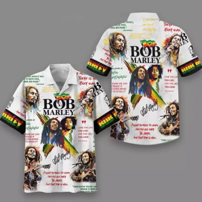 Colorful reggae-themed short-sleeve button-up shirt with vibrant graphics and text, ideal for casual wear.