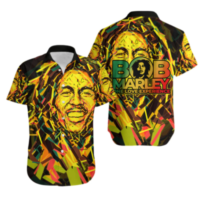 Colorful abstract reggae-themed shirt with vibrant geometric patterns, short sleeves, and button-up style.