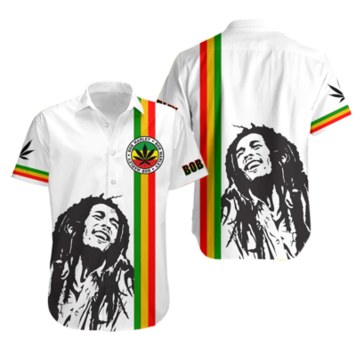 White reggae-themed short-sleeve shirt with colorful stripes and graphic print, casual wear, cotton fabric.