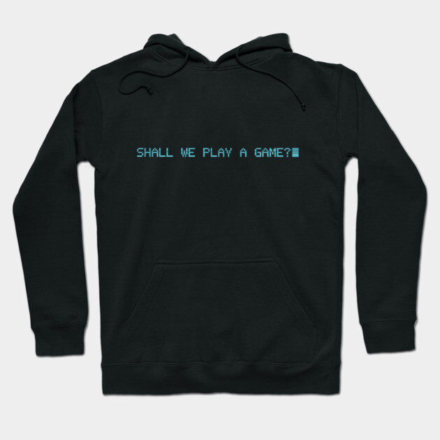 Black hoodie with "Shall We Play a Game?" text in blue. Casual, comfortable style, perfect for gaming enthusiasts.