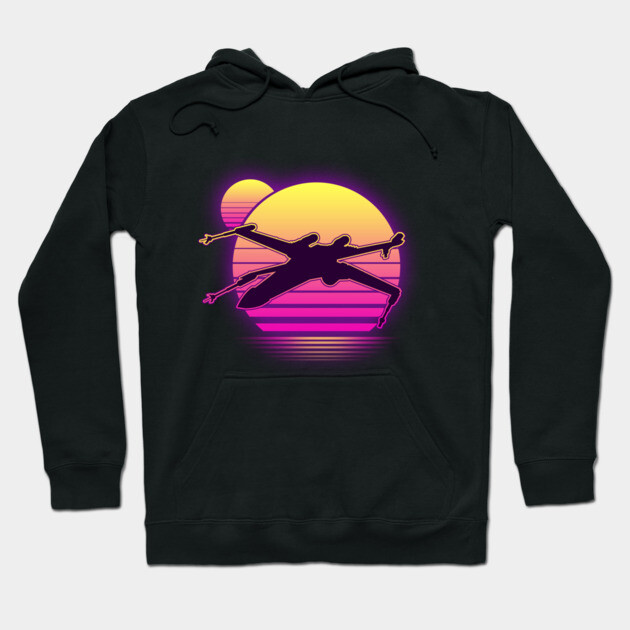 Black hoodie with vibrant sunset graphic and silhouette design, featuring front pocket and adjustable drawstrings.