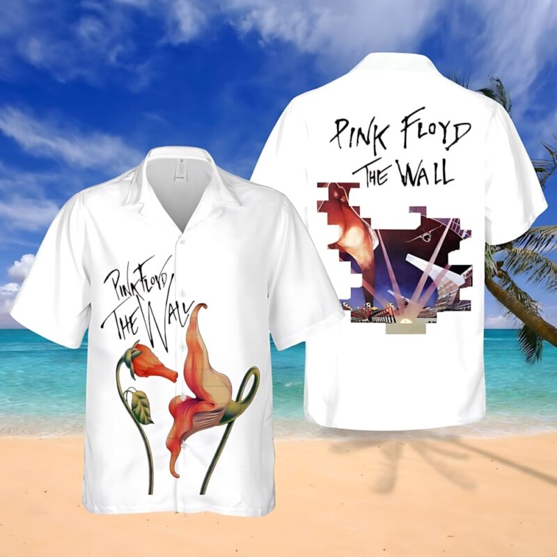 White short-sleeve shirt with floral design and colorful abstract art, perfect for casual beachwear.