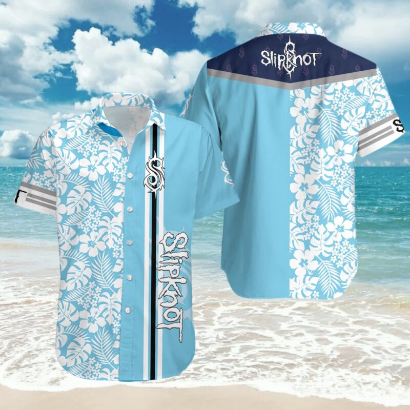 Blue floral Hawaiian shirt with white patterns, short sleeves, casual beachwear, lightweight cotton material.