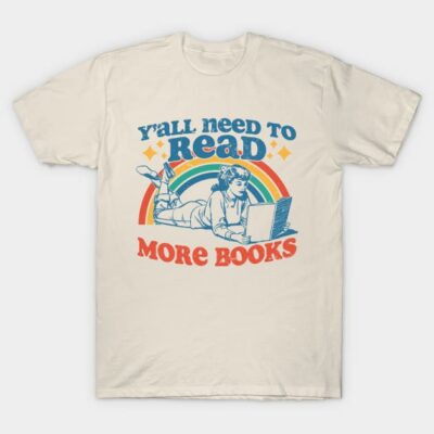 Cream T-shirt with colorful "Y'all Need to Read More Books" design, casual style, perfect for book lovers.