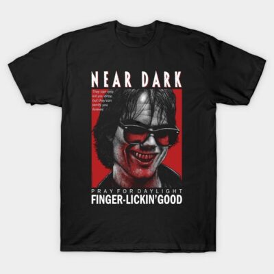 Black graphic T-shirt featuring "Near Dark" horror theme design, ideal for casual wear and film enthusiasts.
