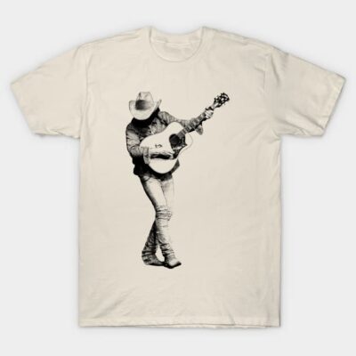 Cream t-shirt featuring a cowboy playing guitar graphic, casual style, cotton material, perfect for music lovers.