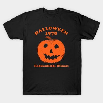 Black Halloween 1978 T-shirt with orange pumpkin graphic, Haddonfield Illinois text, casual cotton style, unisex.