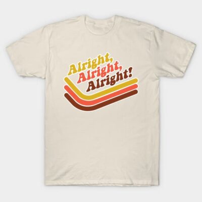 Beige t-shirt with retro "Alright, Alright, Alright!" print in yellow, red, and brown, casual cotton style.