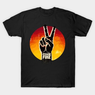 Black t-shirt with "Cease Fire" peace sign graphic, featuring a vibrant red and orange sunset background. Cotton material.