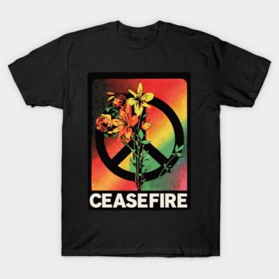 Black T-shirt with colorful peace sign and flowers, text "CEASEFIRE". Casual, graphic tee for everyday wear.