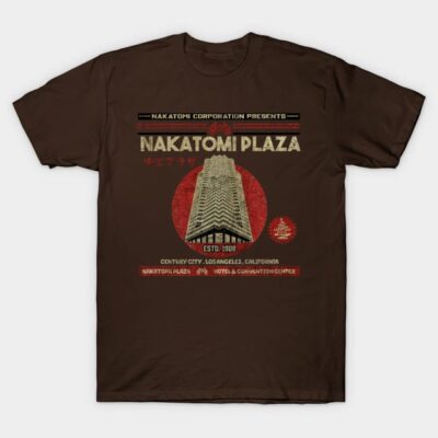 Brown "Nakatomi Plaza" graphic T-shirt, vintage style, featuring building design, casual wear, cotton material.