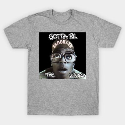 Gray graphic t-shirt featuring Brooklyn-themed design, casual style, soft cotton material, unisex fashion wear.