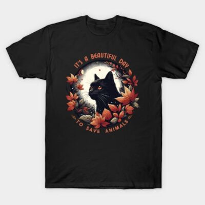 Black T-shirt with cat and autumn leaves design, "It's a Beautiful Day to Save Animals" text, casual wear.