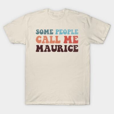 Cream t-shirt with "Some People Call Me Maurice" in colorful retro font, casual wear, cotton material.