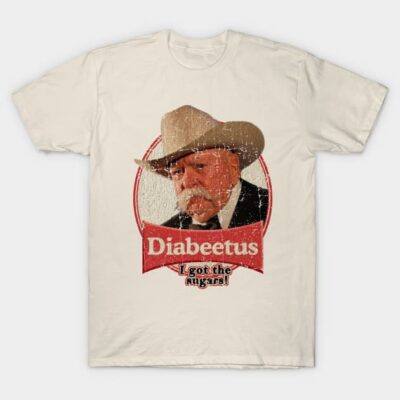 Cream vintage-style t-shirt with humorous graphic and text, featuring a cowboy theme, perfect for casual wear.