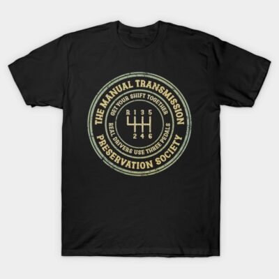 Black t-shirt with manual transmission graphic and text, made from cotton, casual style for car enthusiasts.