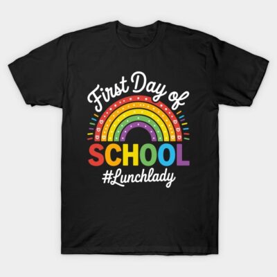 Black t-shirt with colorful rainbow and "First Day of School #Lunchlady" text, casual style, cotton material.