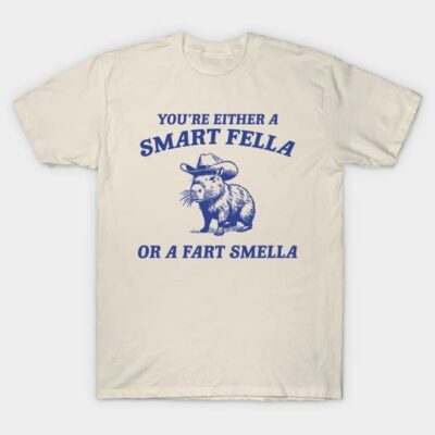 Cream-colored t-shirt with humorous blue text and illustration, casual wear, cotton material, novelty style.