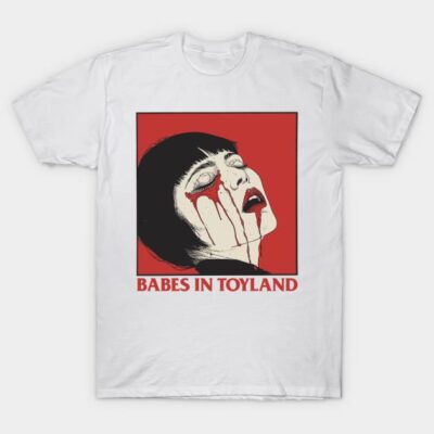 White graphic t-shirt featuring "Babes in Toyland" text and bold red and black design, casual unisex style cotton apparel.