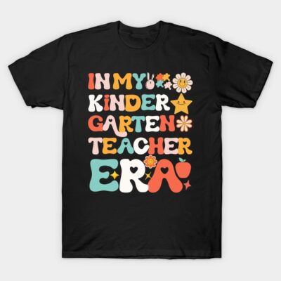 Black T-shirt with colorful "In My Kindergarten Teacher Era" text, playful design, cotton material, casual wear.