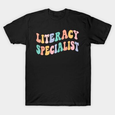 Black "Literacy Specialist" T-shirt with colorful retro font, casual style, perfect for educators, cotton material.