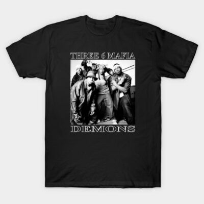 Black graphic t-shirt with bold "Three 6 Mafia Demons" text and group image, casual streetwear style, cotton material.